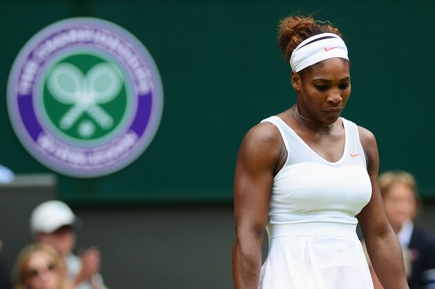 LONDON, ENGLAND - JULY 01:  Serena Williams of United States of America looks dejected during her Ladies' Singles fourth round match against Sabine Lisicki of Germany on day seven of the Wimbledon Lawn Tennis Championships at the All England Lawn Tennis and Croquet Club on July 1, 2013 in London, England.  (Photo by Mike Hewitt/Getty Images)