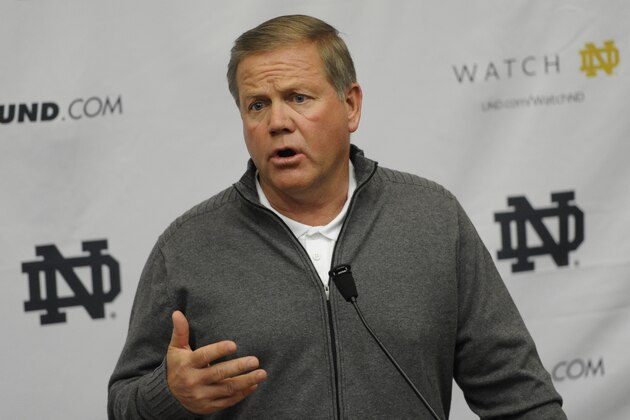 Notre Dame football coach Brian Kelly talks to the media as spring football practice begins Friday, Feb. 28, 2014 in South Bend, Ind. (AP Photo/Joe Raymond)