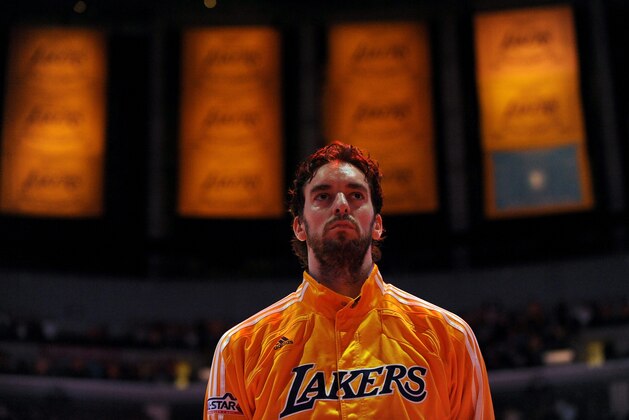 LOS ANGELES - NOVEMBER 2:  Pau Gasol #16 of the Los Angeles Lakers stands on the court for the national anthem before the game against the Memphis Grizzlies at Staples Center on November 2, 2010 in Los Angeles, California. NOTE TO USER: User expressly acknowledges and agrees that, by downloading and/or using this Photograph, user is consenting to the terms and conditions of the Getty Images License Agreement. Mandatory Copyright Notice: Copyright 2010 NBAE (Photo by Evan Gole/NBAE via Getty Images)