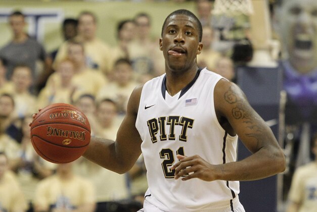 Dec 3, 2013; Pittsburgh, PA, USA; Pittsburgh Panthers forward Lamar Patterson (21) brings the ball up court against the Penn State Nittany Lions during the second half at the Petersen Events Center. PITT won 78-69. Mandatory Credit: Charles LeClaire-USA TODAY Sports
