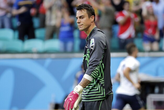 Switzerland's goalkeeper Diego Benaglio reacts after France's Mathieu Valbuena scored his side's third goal during the group E World Cup soccer match between Switzerland and France at the Arena Fonte Nova in Salvador, Brazil, Friday, June 20, 2014. (AP Photo/Bernat Armangue)