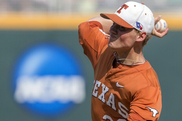 Texas starting pitcher Nathan Thornhill (36) works against Vanderbilt in the eighth inning of an NCAA College World Series baseball game in Omaha, Neb., Friday, June 20, 2014. (AP Photo/Nati Harnik)