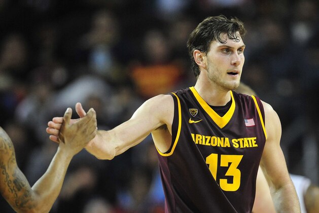 January 9, 2014; Los Angeles, CA, USA; Arizona State Sun Devils center Jordan Bachynski (13) reacts after drawing a foul from the Southern California Trojans during the second half at Galen Center. Mandatory Credit: Gary A. Vasquez-USA TODAY Sports