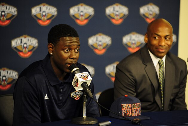 METAIRIE, LA - JULY 12:  Dell Demps, general manager of the New Orleans Pelicans introduces Jrue Holiday, acquired in a trade on July 12, 2013 at the New Orleans Pelicans practice facility in Metairie, Louisiana. NOTE TO USER: User expressly acknowledges and agrees that, by downloading and or using this Photograph, user is consenting to the terms and conditions of the Getty Images License Agreement. Mandatory Copyright Notice: Copyright 2013 NBAE (Photo by Layne Murdoch/NBAE via Getty Images)