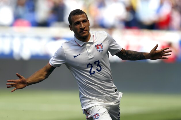 ADVANCE FOR WEEKEND EDITIONS, JUNE 14-15 - FILE - In this June 1, 2014 file photo, United States' Fabian Johnson celebrates after scoring a goal against Turkey in the first half of an international friendly soccer match  in Harrison, N.J. Johnson is one of five German-Americans playing on the American World Cup team. (AP Photo/Julio Cortez, File)