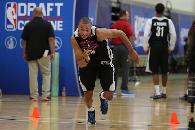 CHICAGO, IL - May 16:  Dante Exum participates in drills during the 2014 Draft Combine on May 16, 2014 at Quest Multisport in Chicago, Illinois. NOTE TO USER:  User expressly acknowledges and agrees that, by downloading and or using this Photograph, user is consenting to the terms and conditions of the Getty Images License Agreement.  Mandatory Copyright Notice:  Copyright 2014 NBAE (Photo by Gary Dineen/NBAE via Getty Images)