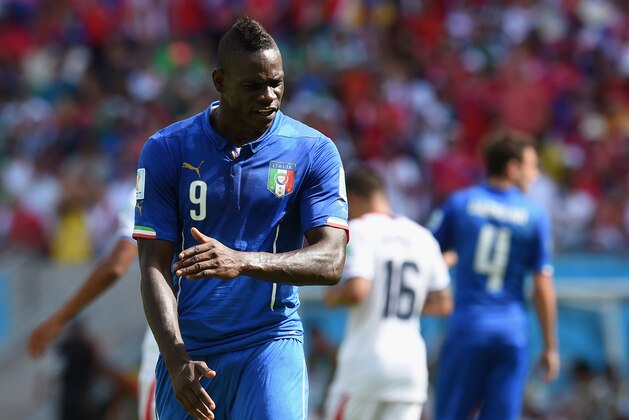 RECIFE, BRAZIL - JUNE 20:  Mario Balotelli of Italy reacts during the 2014 FIFA World Cup Brazil Group D match between Italy and Costa Rica at Arena Pernambuco on June 20, 2014 in Recife, Brazil.  (Photo by Claudio Villa/Getty Images)