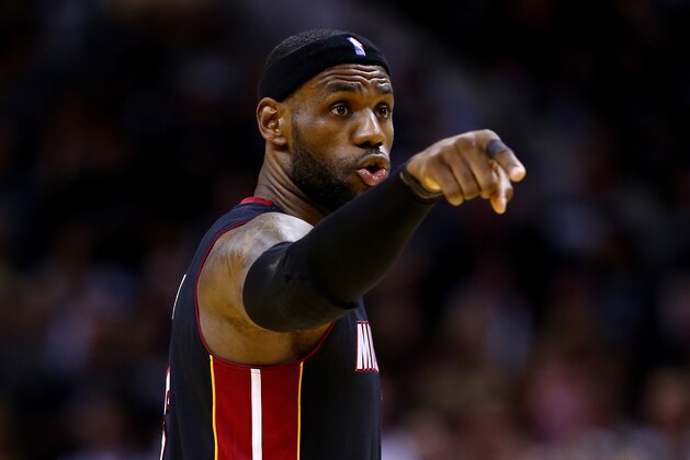 SAN ANTONIO, TX - JUNE 15: LeBron James #6 of the Miami Heat calls a play against the San Antonio Spurs during Game Five of the 2014 NBA Finals at the AT&T Center on June 15, 2014 in San Antonio, Texas. NOTE TO USER: User expressly acknowledges and agrees that, by downloading and or using this photograph, User is consenting to the terms and conditions of the Getty Images License Agreement.  (Photo by Andy Lyons/Getty Images)