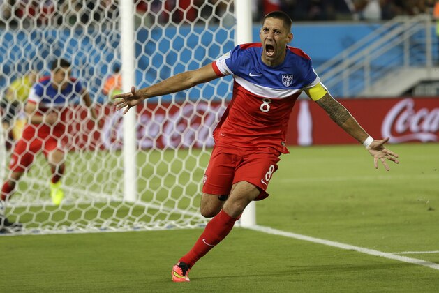 United States' Clint Dempsey celebrates after scoring the opening goal during the group G World Cup soccer match between Ghana and the United States at the Arena das Dunas in Natal, Brazil, Monday, June 16, 2014.  (AP Photo/Ricardo Mazalan)