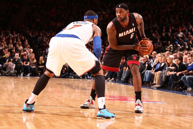 NEW YORK, NY - JANUARY 9: LeBron James #6 of the Miami Heat controls the ball against Carmelo Anthony #7 of the New York Knicks during a game at Madison Square Garden in New York City on January 9, 2014.  NOTE TO USER: User expressly acknowledges and agrees that, by downloading and or using this photograph, User is consenting to the terms and conditions of the Getty Images License Agreement. Mandatory Copyright Notice: Copyright 2014 NBAE  (Photo by Nathaniel S. Butler/NBAE via Getty Images)