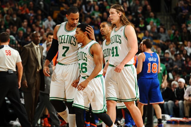 BOSTON, MA - DECEMBER 13: Jared Sullinger #7, Phil Pressey #26 and Kelly Olynyk #41 of the Boston Celtics walk back to the bench after a play against the New York Knicks on December 13, 2013 at the TD Garden in Boston, Massachusetts.  NOTE TO USER: User expressly acknowledges and agrees that, by downloading and or using this photograph, User is consenting to the terms and conditions of the Getty Images License Agreement. Mandatory Copyright Notice: Copyright 2013 NBAE  (Photo by Brian Babineau/NBAE via Getty Images)