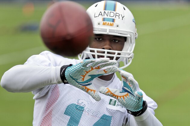 Miami Dolphins wide receiver Jarvis Landry catches a ball from a football throwing machine during NFL football mini camp, Wednesday, June 18, 2014, in Davie, Fla. (AP Photo/Wilfredo Lee) Miami Dolphins wide receiver Jarvis Landry catches a ball from a football throwing machine during NFL football mini camp, Wednesday, June 18, 2014, in Davie, Fla. (AP Photo/Wilfredo Lee)