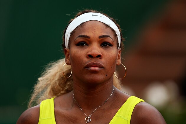 PARIS, FRANCE - MAY 28:  Serena Williams of the United States looks on during her women's singles match against Garbine Muguruza of Spain on day four of the French Open at Roland Garros on May 28, 2014 in Paris, France.  (Photo by Clive Brunskill/Getty Images)