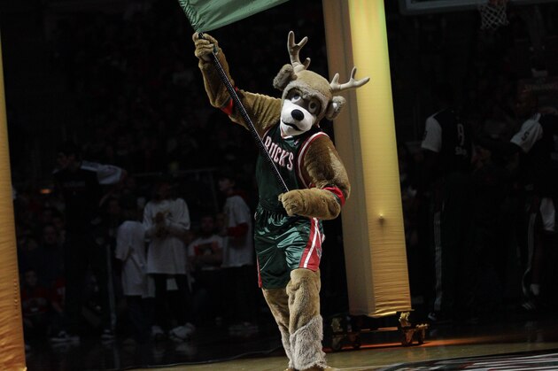 Milwaukee Bucks mascot Bango waves a flag before an NBA basketball game against the Atlanta Hawks Monday, Dec. 27, 2010, in Milwaukee. (AP Photo/Morry Gash)