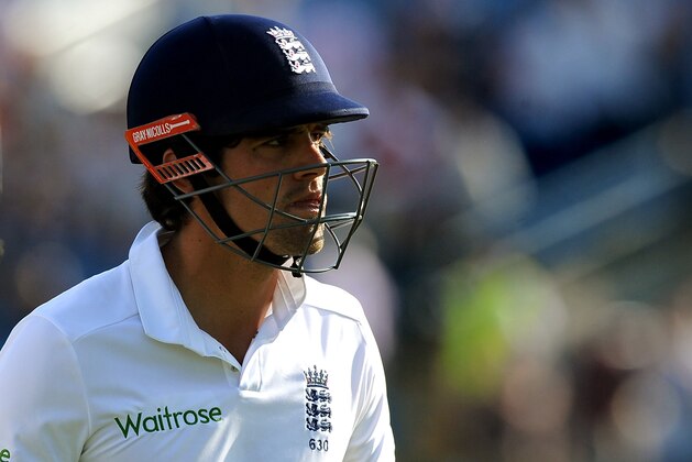 England's Alastair Cook walks back to the pavilion at end of play during the Second Test Match against Sri Lanka at Headingley cricket ground, Leeds, England, on Friday, June 20, 2014. (AP Photo/Rui Vieira)