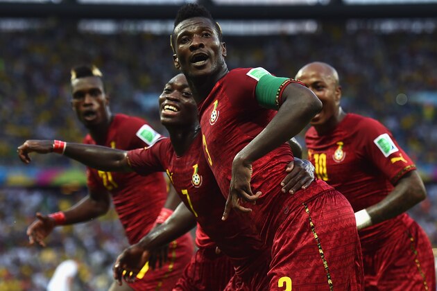 FORTALEZA, BRAZIL - JUNE 21:  Asamoah Gyan of Ghana celebrates scoring his team's second goal during the 2014 FIFA World Cup Brazil Group G match between Germany and Ghana at Castelao on June 21, 2014 in Fortaleza, Brazil.  (Photo by Laurence Griffiths/Getty Images)