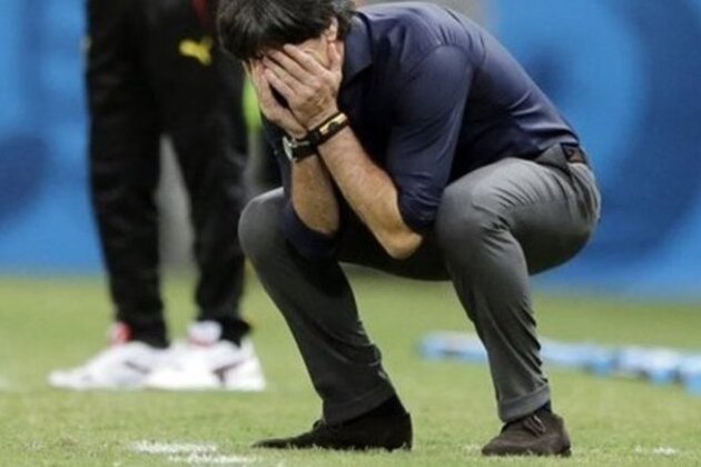Germany's head coach Joachim Loew reacts during the group G World Cup soccer match between Germany and Ghana at the Arena Castelao in Fortaleza, Brazil, Saturday, June 21, 2014. (AP Photo/Matthias Schrader)
