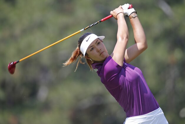 Michelle Wie watches her tee shot  on the second hole during the second round of the U.S. Women's Open golf tournament in Pinehurst, N.C., Friday, June 20, 2014. (AP Photo/John Bazemore)