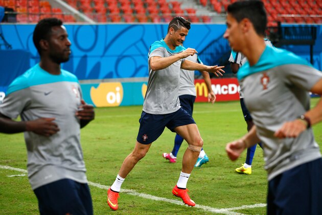 MANAUS, BRAZIL - JUNE 21:  Cristiano Ronaldo of Portugal grimaces as he works out during training at Arena Amazonia on June 21, 2014 in Manaus, Brazil.  (Photo by Kevin C. Cox/Getty Images)