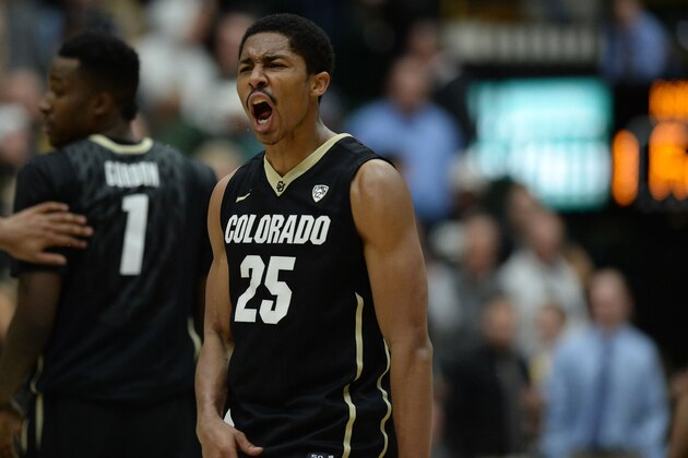 Dec 3, 2013; Fort Collins, CO, USA; Colorado Buffaloes guard Spencer Dinwiddie (25) reacts to the win over the Colorado State Rams at Moby Arena. The Colorado Buffaloes defeated the Colorado State Rams 67-62. Mandatory Credit: Ron Chenoy-USA TODAY Sports
