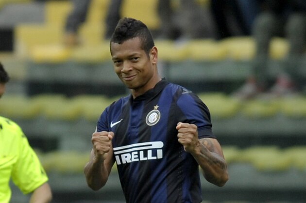 Inter Milan's Fredy Guarin of Colombia celebrates after scoring a goal during a Serie A soccer match against Parma, at Parma's Tardini stadium, Italy, Saturday, April 19, 2014. (AP Photo/Marco Vasini)