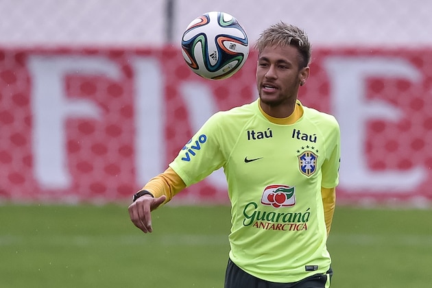 TERESOPOLIS, BRAZIL - JUNE 20: Neymar in action during a training session of the Brazilian national football team at the squad's Granja Comary training complex, on June 20, 2014 in Teresopolis, 90 km from downtown Rio de Janeiro, Brazil. (Photo by Buda Mendes/Getty Images)