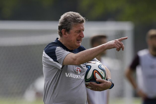 England national soccer team head coach Roy Hodgson points during a squad training session for the 2014 soccer World Cup at the Urca military base in Rio de Janeiro, Brazil, Saturday, June 21, 2014.  Costa Rica's surprise 1-0 win over Italy on Friday meant that England made its most humiliating exit from a World Cup since 1958, following consecutive defeats by the Italians and then Uruguay in Group D.  England play Costa Rica in their final Group D match on Tuesday.  (AP Photo/Matt Dunham)