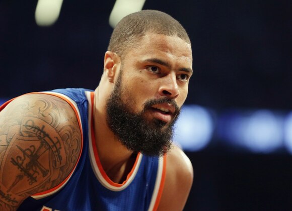 NEW YORK, NY - APRIL 15: Tyson Chandler #6 of the New York Knicks waits for play to begin against the Brooklyn Nets at the Barclays Center on April 15, 2014 in the Brooklyn borough of New York City. NOTE TO USER: User expressly acknowledges and agrees that, by downloading and/or using this Photograph, user is consenting to the terms and conditions of the Getty Images License Agreement.  (Photo by Bruce Bennett/Getty Images)