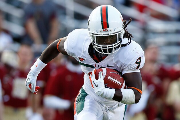 CHESTNUT HILL, MA - SEPTEMBER 01:  Malcolm Lewis #9 of the Miami Hurricanes in action against the Boston College Eagles during the game on September 1, 2012 at Alumni Stadium in Chestnut Hill, Massachusetts.  (Photo by Jared Wickerham/Getty Images)