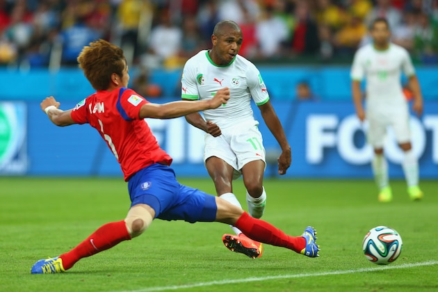 PORTO ALEGRE, BRAZIL - JUNE 22: Yacine Brahimi of Algeria scores his team's fourth goal during the 2014 FIFA World Cup Brazil Group H match between South Korea and Algeria at Estadio Beira-Rio on June 22, 2014 in Porto Alegre, Brazil.  (Photo by Jeff Gross/Getty Images)