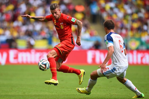 RIO DE JANEIRO, BRAZIL - JUNE 22: Toby Alderweireld of Belgium controls the ball against Maksim Kanunnikov of Russia during the 2014 FIFA World Cup Brazil Group H match between Belgium and Russia at Maracana on June 22, 2014 in Rio de Janeiro, Brazil.  (Photo by Matthias Hangst/Getty Images)
