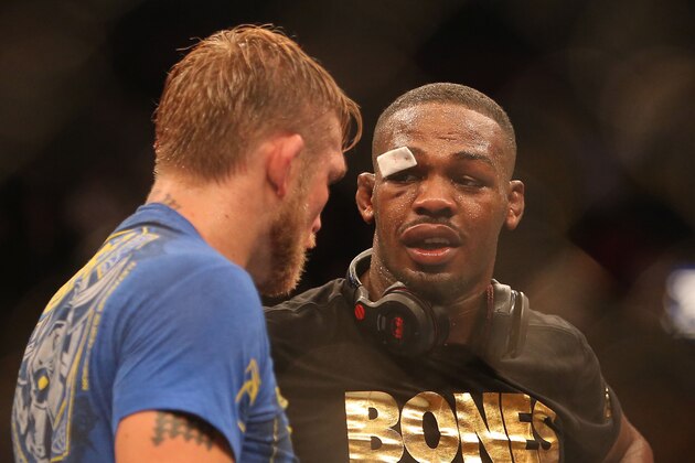 Sep 21, 2013; Toronto, Ontario, CAN; Jon Jones talks to Alexander Gustafsson (left) after their Light Heavyweight Championship bout while wearing the championship belt at UFC 165 at the Air Canada Centre. Mandatory Credit: Tom Szczerbowski-USA TODAY Sports