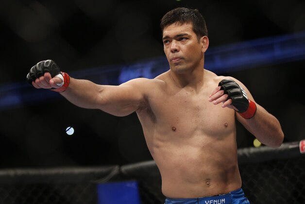 Lyoto Machida Dan Henderson during their UFC 157 light heavyweight mixed martial arts match in Anaheim, Calif., Saturday, Feb. 23, 2013. Machida won by split decision after the third round. (AP Photo/Jae C. Hong)