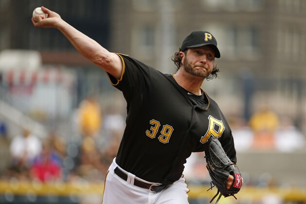 Pittsburgh Pirates relief pitcher Jason Grilli delivers during the ninth inning of a baseball game against the Cincinnati Reds in Pittsburgh Thursday, June 19, 2014. The Pirates won in 12 innings, 4-3. (AP Photo/Gene J. Puskar)