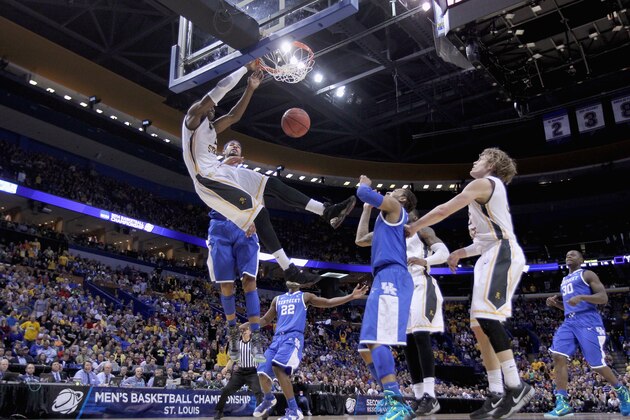 ST LOUIS, MO - MARCH 23:  Cleanthony Early #11 of the Wichita State Shockers shoots the ball against the Kentucky Wildcats during the third round of the 2014 NCAA Men's Basketball Tournament at Scottrade Center on March 23, 2014 in St Louis, Missouri.  (Photo by Andy Lyons/Getty Images)