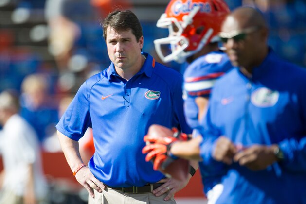 GAINESVILLE, FL - NOVEMBER 23: Head coach Will Muschamp of the Florida Gators watches his team warm up before their game against the Georgia Southern Eagles on November 23, 2013 at Ben Hill Griffin Stadium in Gainesville, Florida. Georgia Southern defeated Florida 26-20. (Photo by Michael Chang/Getty Images) GAINESVILLE, FL - NOVEMBER 23: Head coach Will Muschamp of the Florida Gators watches his team warm up before their game against the Georgia Southern Eagles on November 23, 2013 at Ben Hill Griffin Stadium in Gainesville, Florida. Georgia Southern defeated Florida 26-20. (Photo by Michael Chang/Getty Images)