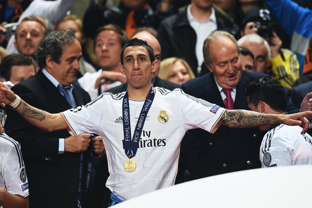 LISBON, PORTUGAL - MAY 24:  Angel Di Maria of Real Madrid celebrates victory after the UEFA Champions League Final between Real Madrid and Atletico de Madrid at Estadio da Luz on May 24, 2014 in Lisbon, Portugal.  (Photo by Laurence Griffiths/Getty Images)