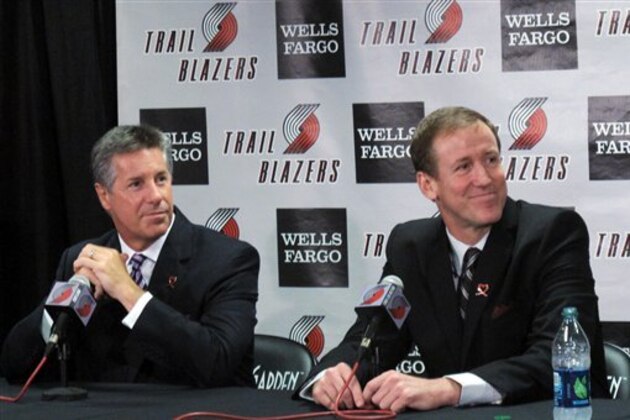 Portland Trail Blazers general manager Neil Olshey, left, and new head coach Terry Stotts appear during an NBA basketball news conference, Wednesday, Aug. 8, 2012, in Portland, Ore. (AP Photo/Nigel Duara)
