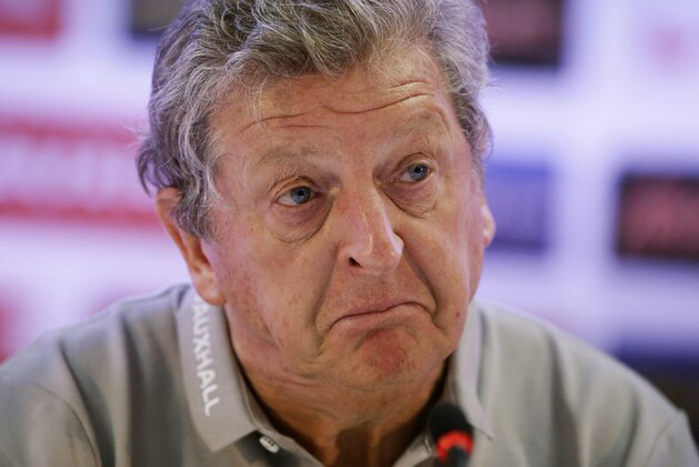 England national soccer team head coach Roy Hodgson pulls an expression as he speaks during a press conference after a squad training session that was closed to the media for the 2014 soccer World Cup at the Urca military base in Rio de Janeiro, Brazil, Sunday, June 22, 2014.  Costa Rica's surprise 1-0 win over Italy on Friday meant that England made its most humiliating exit from a World Cup since 1958, following consecutive defeats by the Italians and then Uruguay in Group D.  England play Costa Rica in their final Group D match on Tuesday.  (AP Photo/Matt Dunham)