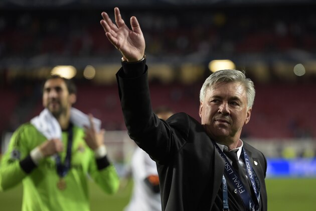 Real's coach Carlo Ancelotti, gestures, at the end of the Champions League final soccer match between Atletico Madrid and Real Madrid in Lisbon, Portugal, Saturday, May 24, 2014. Real Madrid won 4-1. (AP Photo/Manu Fernandez)