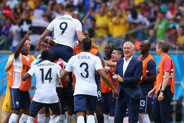 SALVADOR, BRAZIL - JUNE 20: Olivier Giroud of France celebrates with teammates after scoring his team's first goal during the 2014 FIFA World Cup Brazil Group E match between Switzerland and France at Arena Fonte Nova on June 20, 2014 in Salvador, Brazil.  (Photo by Elsa/Getty Images)