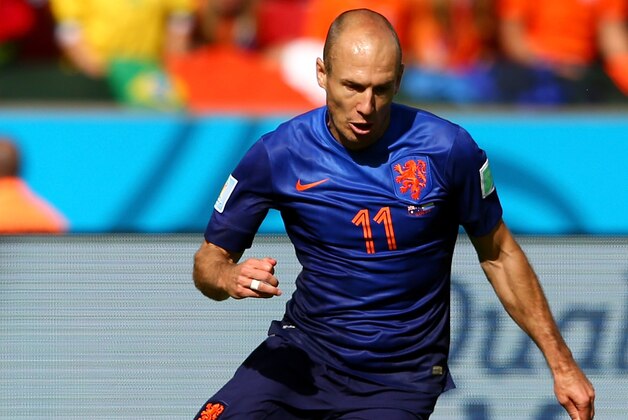 PORTO ALEGRE, BRAZIL - JUNE 18:  Arjen Robben of the Netherlands controls the ball during the 2014 FIFA World Cup Brazil Group B match between Australia and Netherlands at Estadio Beira-Rio on June 18, 2014 in Porto Alegre, Brazil.  (Photo by Cameron Spencer/Getty Images)