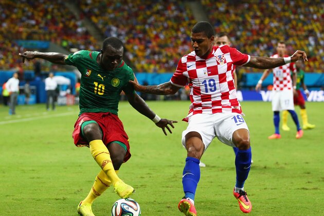 MANAUS, BRAZIL - JUNE 18: Vincent Aboubakar of Cameroon controls the ball against Sammir of Croatia during the 2014 FIFA World Cup Brazil Group A match between Cameroon and Croatia at Arena Amazonia on June 18, 2014 in Manaus, Brazil.  (Photo by Clive Brunskill/Getty Images)