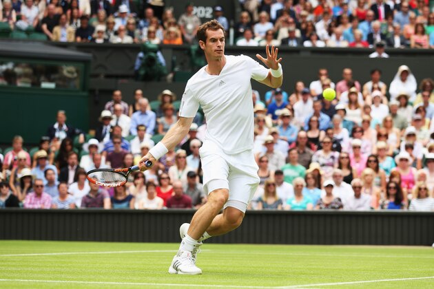 LONDON, ENGLAND - JUNE 23: Andy Murray of Great Britain plays a forehand during his Gentlemen's Singles first round match against David Goffin of Belgium on day one of the Wimbledon Lawn Tennis Championships at the All England Lawn Tennis and Croquet Club at Wimbledon on June 23, 2014 in London, England.  (Photo by Matthew Stockman/Getty Images)