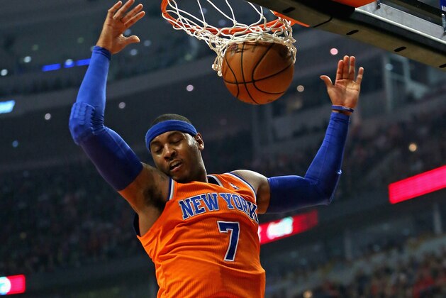 CHICAGO, IL - OCTOBER 31: Carmelo Anthony #7 of the New York Knicks dunks against the Chicago Bulls at the United Center on October 31, 2013 in Chicago, Illinois. NOTE TO USER: User expressly acknowledges and agrees that, by downloading and or using this photograph, User is consenting to the terms and conditions of the Getty Images License Agreement.  (Photo by Jonathan Daniel/Getty Images)