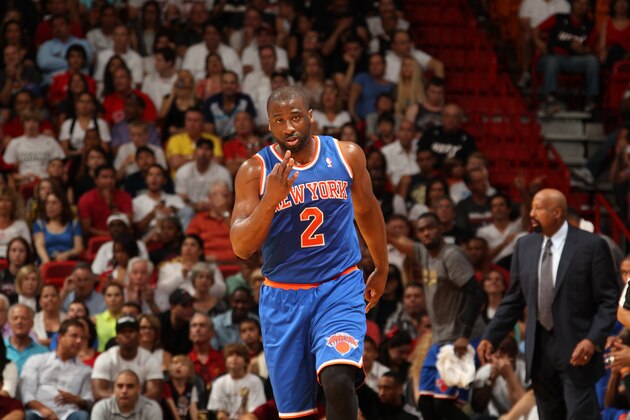 MIAMI, FL - April 6: Raymond Felton #2 of the New York Knicks celebrates a basket during the game against the Miami Heat at the American Airlines Arena in Miami, Florida on April 6, 2014. NOTE TO USER: User expressly acknowledges and agrees that, by downloading and/or using this photograph, user is consenting to the terms and conditions of the Getty Images License Agreement. Mandatory copyright notice: Copyright NBAE 2014 (Photo by Issac Baldizon/NBAE via Getty Images)