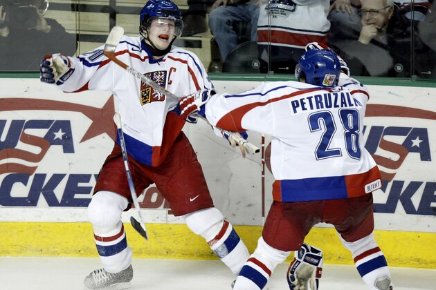 GRAND FORKS, ND - JANUARY 4:  Petr Vrana #20 and Jakub Petruzalek #28 of the Czech Republic celebrate after defeating the USA in the bronze medal game at the World Junior Hockey Championships on January 4, 2005 at the Ralph Engelstad Arena in Grand Forks, North Dakota. The Czech Republic defeated the USA 3-2 to win the bronze medal.  (Photo by Lyle Stafford/Getty Images)