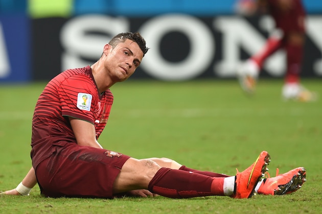 Portugal's Cristiano Ronaldo reacts during the group G World Cup soccer match between the USA and Portugal at the Arena da Amazonia in Manaus, Brazil, Sunday, June 22, 2014. (AP Photo/Paulo Duarte)