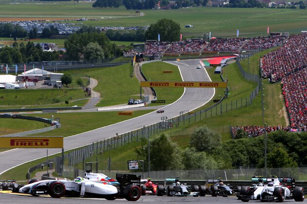SPIELBERG, AUSTRIA - JUNE 22:  Felipe Massa of Brazil and Williams leads Valtteri Bottas of Finland and Williams during the Austrian Formula One Grand Prix at Red Bull Ring on June 22, 2014 in Spielberg, Austria.  (Photo by Dom Romney/Getty Images)