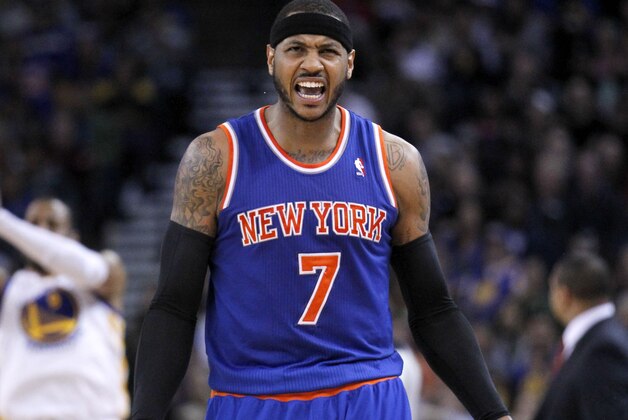 Mar 30, 2014; Oakland, CA, USA; New York Knicks forward Carmelo Anthony (7) reacts on the court against the Golden State Warriors in the fourth quarter at Oracle Arena. The Knicks won 89-84. Mandatory Credit: Cary Edmondson-USA TODAY Sports